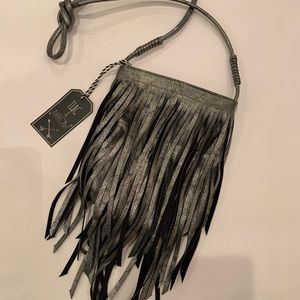 Precious fringe metallic grey crossbody bag. Never been used.
